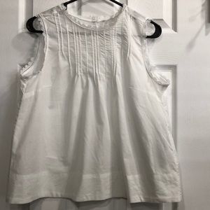 White sleeveless shirt (not a t-shirt)